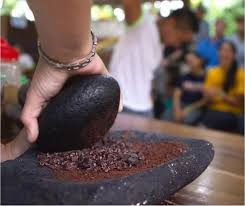 Grinding cacao beans