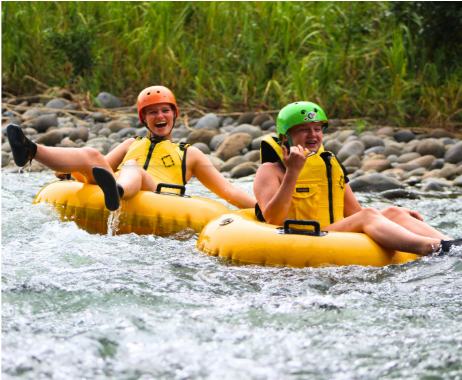 People tubing down a river